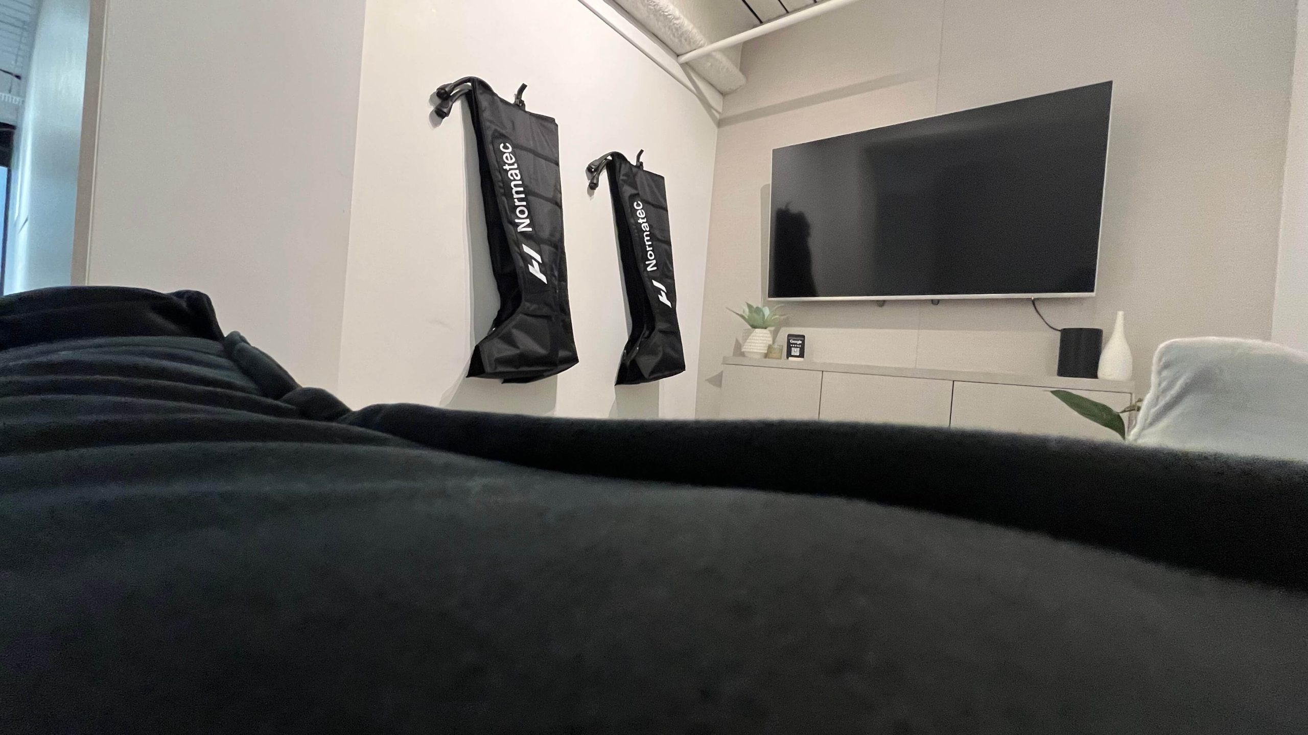 Compression boots session setup at Brysk Wellness & Recovery Studio in Manchester