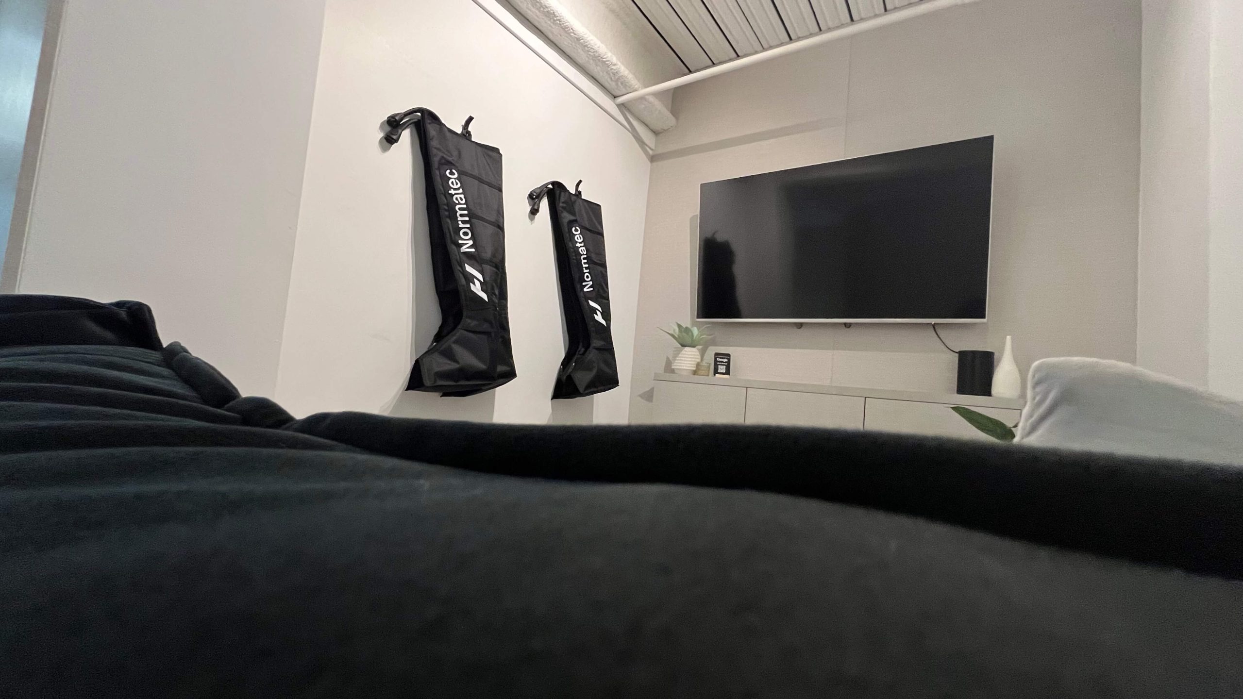 Compression therapy boots inside Brysk recovery studio