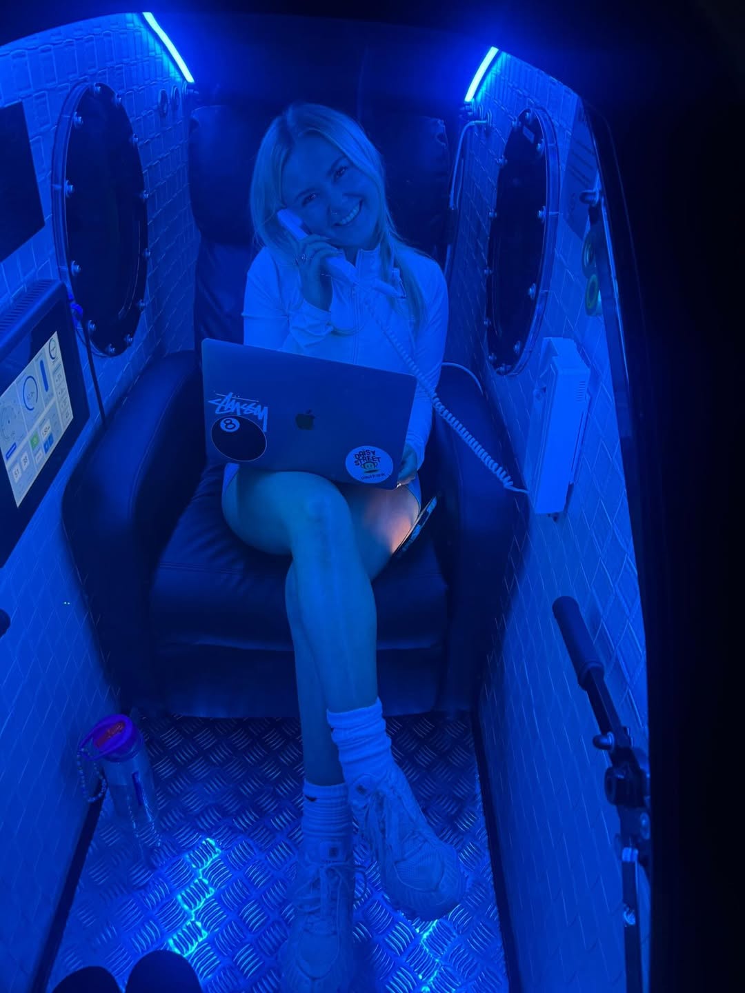 Client relaxing inside Brysk's hyperbaric oxygen chamber in Manchester